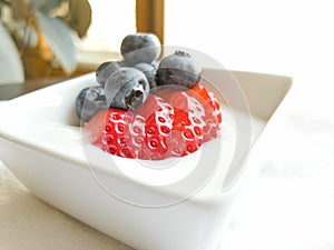 Strawberry Blueberry Yogurt in White Ramekin