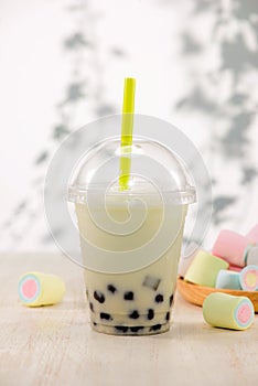 Strawberry Boba Bubble Tea with marshmallow and crushed ice.