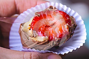 Strawberry bonbon in close-up photo. Brazilian sweet. photo