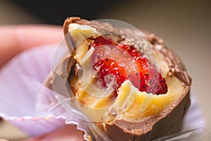 Strawberry bonbon in close-up photo. Brazilian sweet. photo