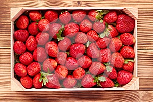 Strawberry box placed on a wooden table