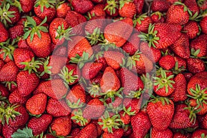 Strawberry box placed on a wooden table, healthy living concept