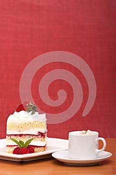 Strawberry cake with cappucino