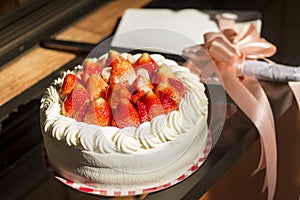 Strawberry sponge cake for seasons greetings. photo