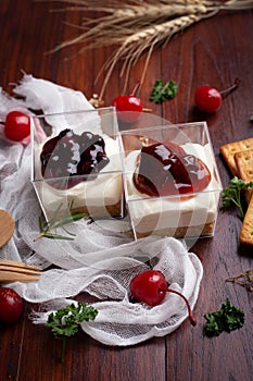 Strawberry cheese pie and Blueberry cheese pie on wooden table