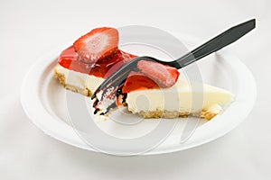 Strawberry Cheesecake Cut in Half with a Fork