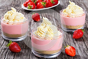 Strawberry Cheesecake Mousse Cups decorated by homemade ice cream