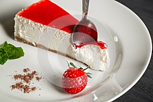 Strawberry cheesecake on a white plate