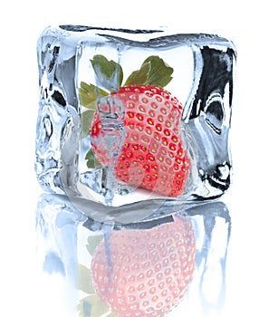 Strawberry chilled in Ice cube on white background cuto