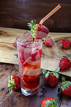Strawberry cocktail with fresh fruit and ice