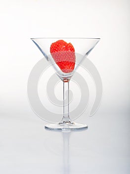 Strawberry in cocktail glass