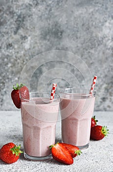 Strawberry cocktail - a milkshake with ice cream and milk. Strawberry smoothie for breakfast