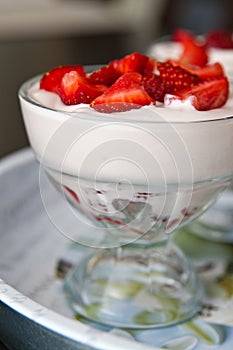 Strawberry and cream dessert in sundae