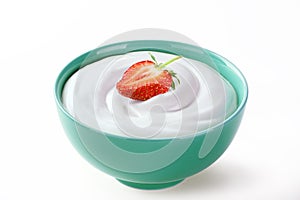 strawberry in cream sour isolated white background