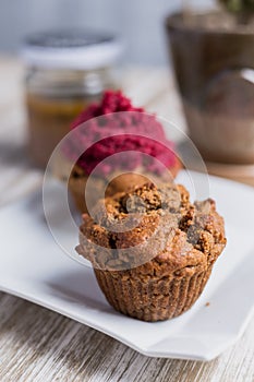 Strawberry cupcakes on a wooden table