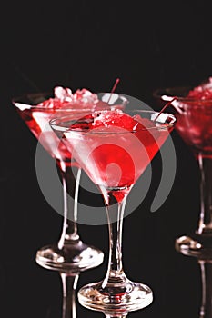 Strawberry daiquiri cocktail with lime, strawberry, cherry and m