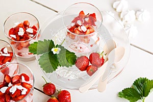 Strawberry dessert with yoghurt cream and meringue in glass