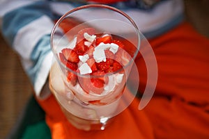 Strawberry dessert with yoghurt cream and meringue in glass