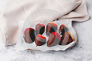 strawberry dipped in dark chocolate for a healthy snack or dessert.