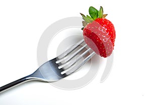 Strawberry on fork