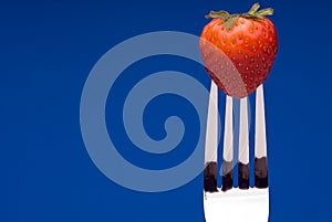 Strawberry on Fork - blue background