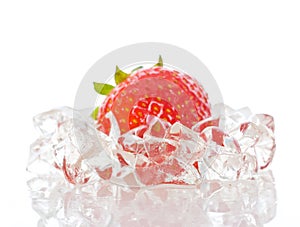 Strawberry frozen in ice photo