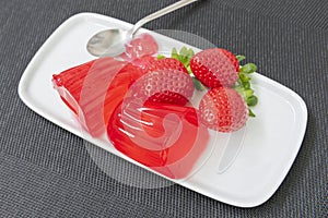 Strawberry and fruit jelly in a bowl