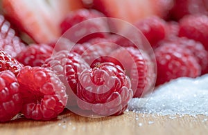 Strawberry. Fruits. Raspberry. Sugar. Macro. Raw. Red