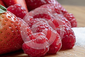 Strawberry Fruits. Raspberry. Sugar. Raw. Macro. Red