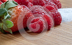 Strawberry. Fruits. Raspberry. Sugar. Raw. Macro. Red