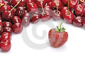 Strawberry and heap of cherries