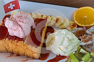 Strawberry honey Toast bread topped with ice cream.