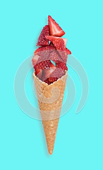 Strawberry ice cream cone with fresh fruits