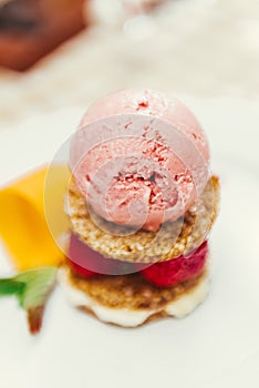 Strawberry ice cream dish with fresh cookie photo