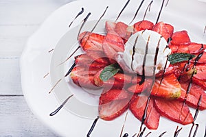 Strawberry with ice cream and mint