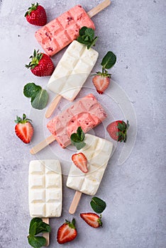 Strawberry ice cream pop sicle with mint
