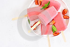 Strawberry ice cream popsicles