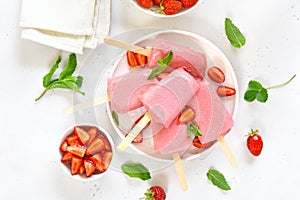 Strawberry ice cream popsicles