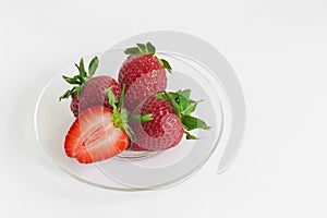 Strawberry ice cream scoop with fresh strawberries on wooden background