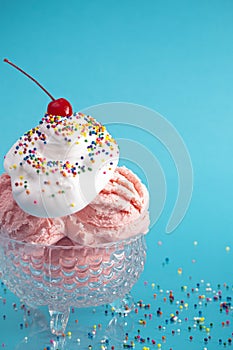 Strawberry Ice Cream Sundae on a Bright Blue Background