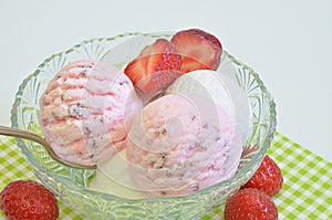 Strawberry ice cream and Vanilla ice cream with fresh Strawberries