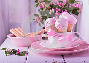 Strawberry Ice Cream in a waffle cones