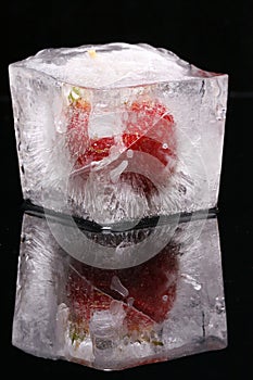 Strawberry in ice cube