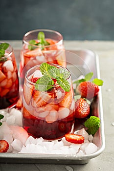 Strawberry ice tea or cold cocktail