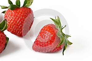 Strawberry isolated. Strawberries with leaf isolate. Whole and half of strawberry on white. Strawberries isolate. Side view