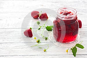 Strawberry jam and fresh strawberries