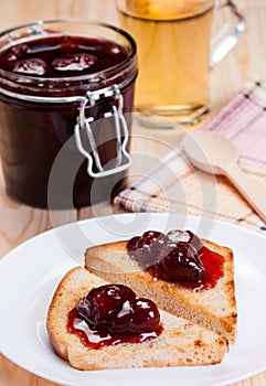 Strawberry jam on toasts.