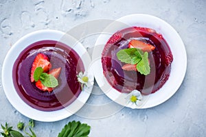 Strawberry jelly with mint leaves, top view