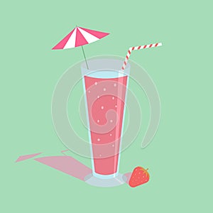 Strawberry juice blended in a glass with an umbrella and straw With strawberries on the side On a green background