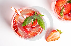 Strawberry juice in a glass isolated